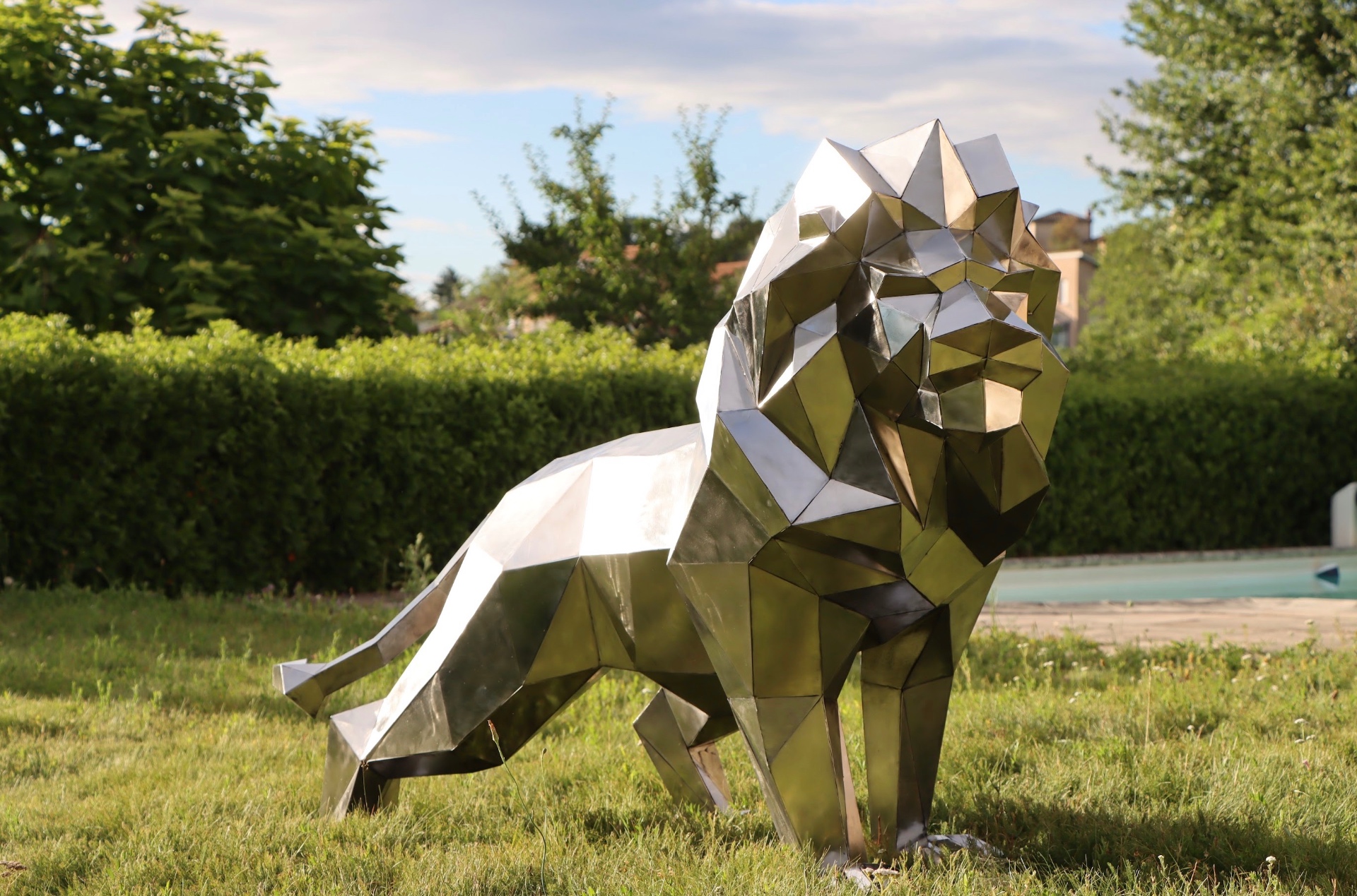 Sculpture lion en acier inoxydable poli — Nico·Métal